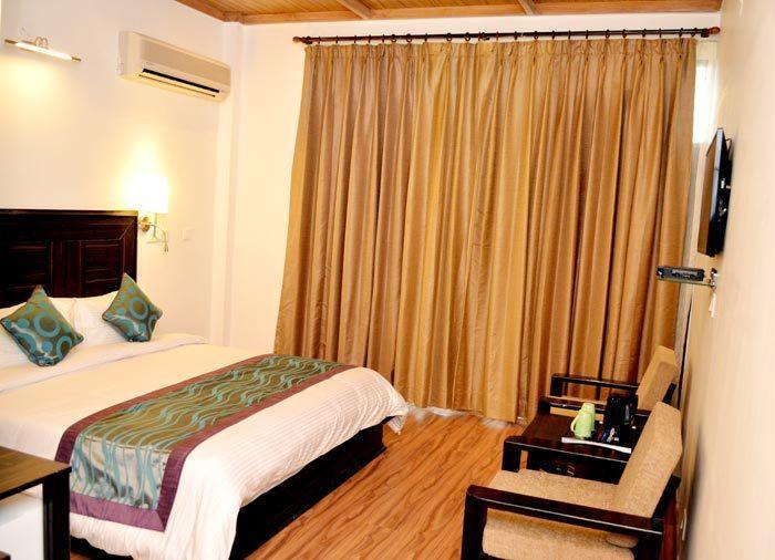 Una Comfort Kasauli Exotica Hotel Room photo